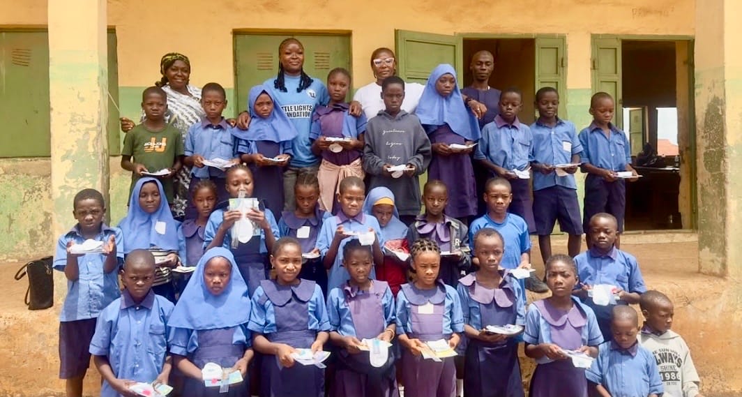 Cross River-Born Corps Member Donates Learning Materials to 100 Abuja Pupils